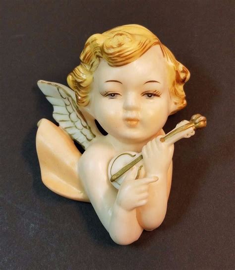 porcelain cherub figurines|ceramic cherub angel figurines.